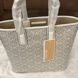 Beautiful White Michael Kors tote. Brand new! Never used with tags attached.